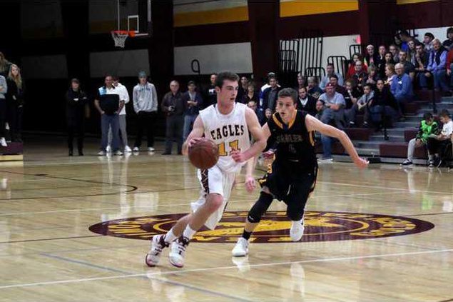 808A7499--Liam Kenney dribbliong past defender vs. Barneveld 11-24-17