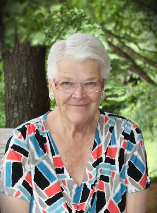 Carolla Gust (“Pat”)