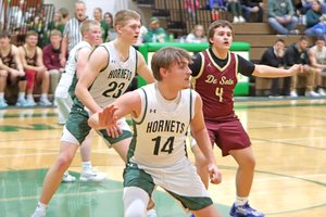 Dakota Cox defends against De Soto 2026