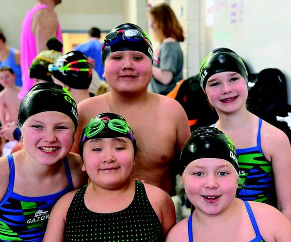 Gators host dual meet vs. Dubuque Dolphins