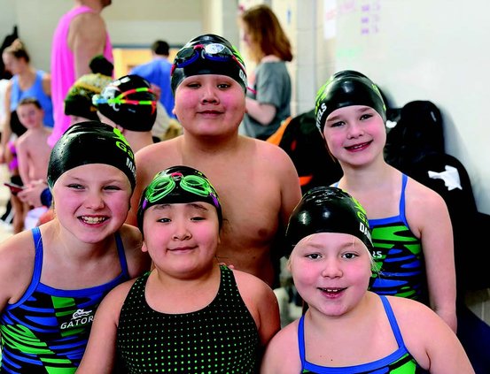 Gators host dual meet vs. Dubuque Dolphins