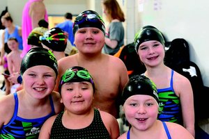 Gators host dual meet vs. Dubuque Dolphins