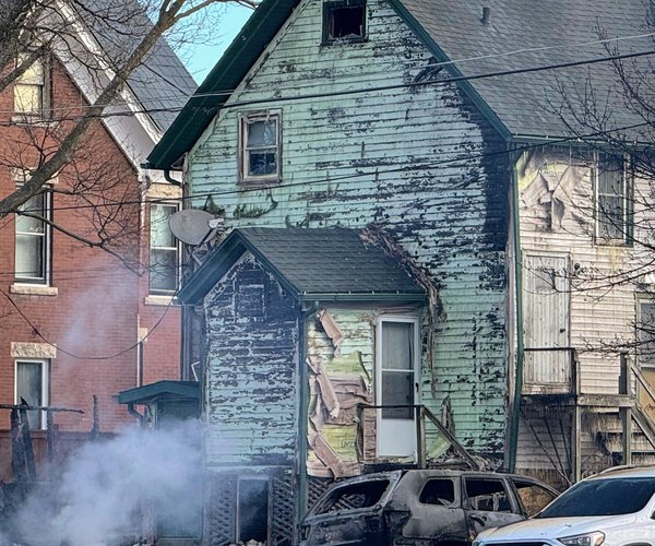 Garage fire displaces residents