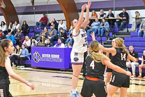 Erin Adrian shoots against Belmont