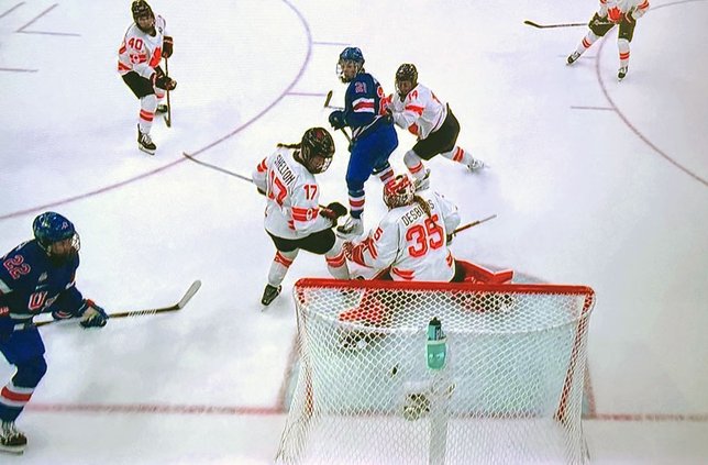 Janecke, USA women win Gold in OT