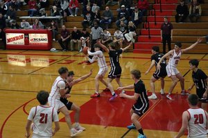 Buckets galore for Monroe in boys home finale