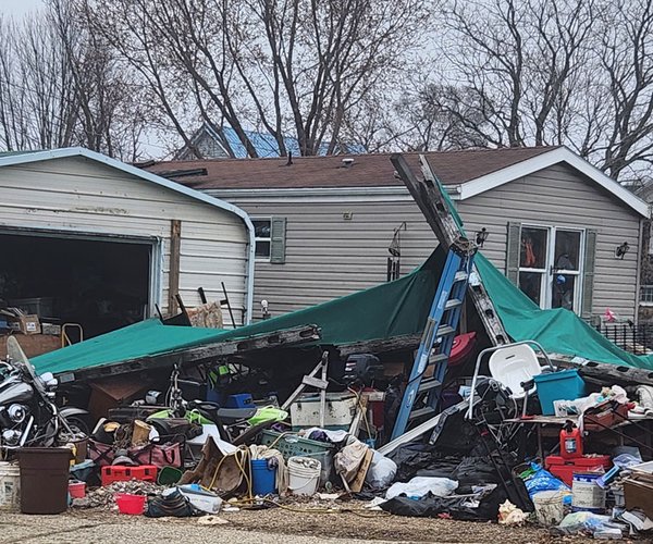 With home in squalor, three arrested for child neglect