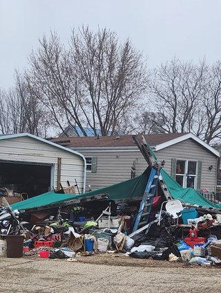 With home in squalor, three arrested for child neglect