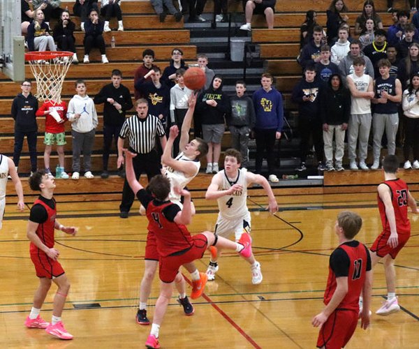 Wildcats fend off Cardinals