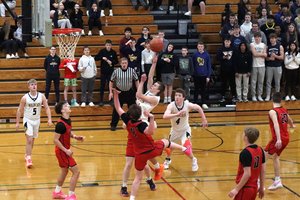 Wildcats fend off Cardinals