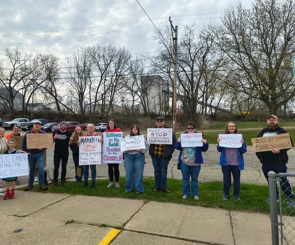 Community members protest Marklein budget influence