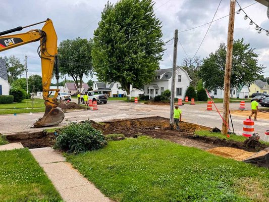 Monroe progresses with curb and gutter, sidewalk installation