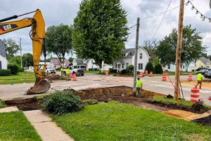 Monroe progresses with curb and gutter, sidewalk installation