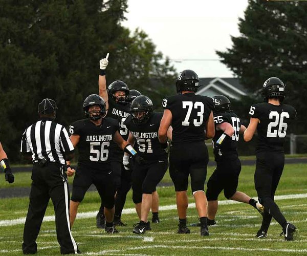 Darlington players celebrate a first half touchdown