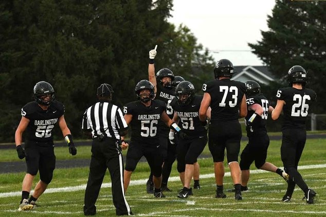 Darlington players celebrate a first half touchdown