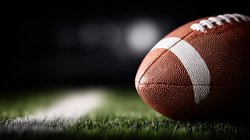 Generic American Football on green field