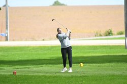 Camryn Knapp watches swing