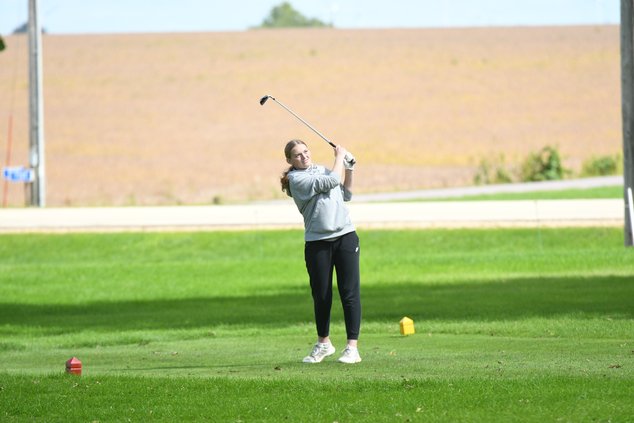 Camryn Knapp watches swing
